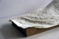 3D-printed landscape models, used in developer and government stakeholder meetings, contrast three design scenarios for a single site, including: 1) Developer’s likely alignment and construction; 2) Upgrade of access road; and 3) Bioengineering and wildlife mitigation. Printed with plant-derived plastics, 2016.