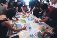 Teams play Land Development vs Conservation Hong Kong, a landscape planning game, at Storefront IS Hong Kong.